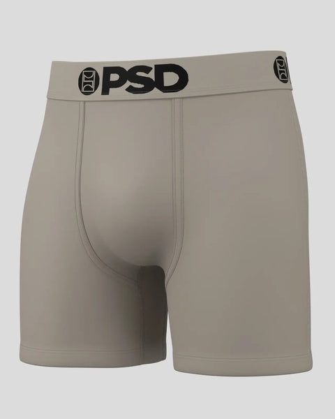 Tan PSD boxer briefs with black waistband logo and center seam detail.