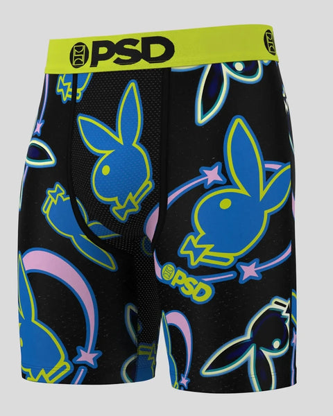 Black shorts with neon blue and yellow Playboy bunny heads, stars, and curved shapes, lime green PSD waistband.