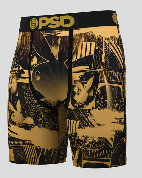 PSD underwear shorts with black and gold Playboy Deco design featuring bunny logos and geometric patterns.
