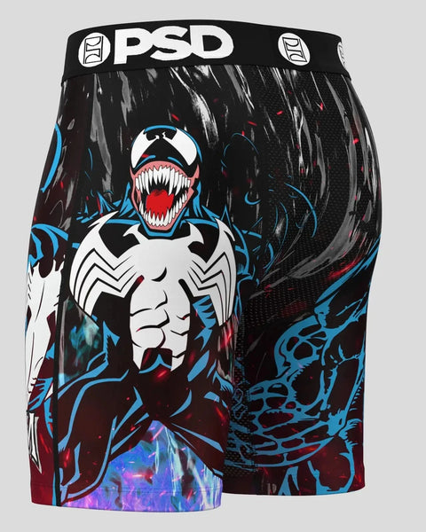 Black PSD shorts with Venom character print, white spider symbol chest, red mouth, blue accents, and colorful gradient panel 
