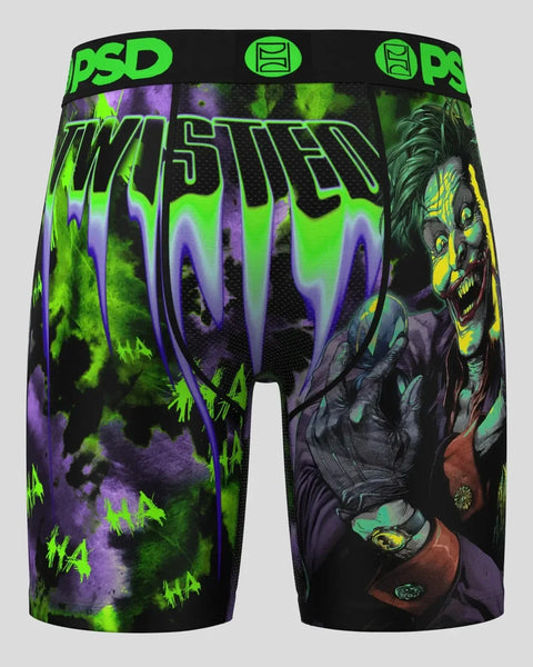 PSD brand shorts with neon green and purple Joker character graphic and twisted text design on black fabric.