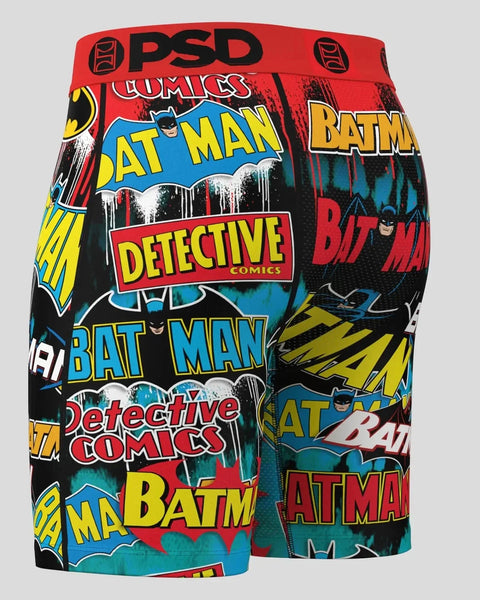 PSD boxer briefs with Batman comic book logos and text in red, blue, yellow, and black.