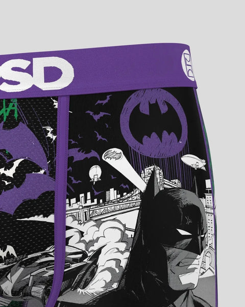 Purple waistband with split design showing Batman imagery on right side and Joker-themed graphics on left side in black, whit