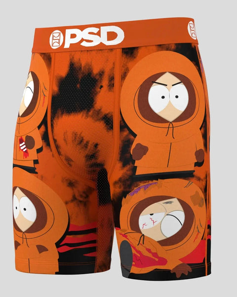 Orange PSD boxer shorts featuring South Park characters in brown hooded outfits with graphic print design.