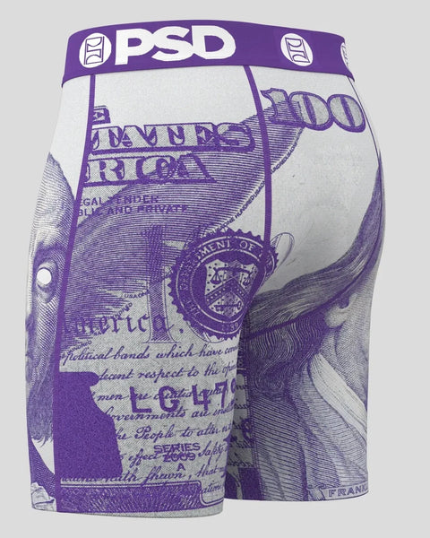 Purple and white PSD boxer briefs with currency bill print and text graphics throughout.