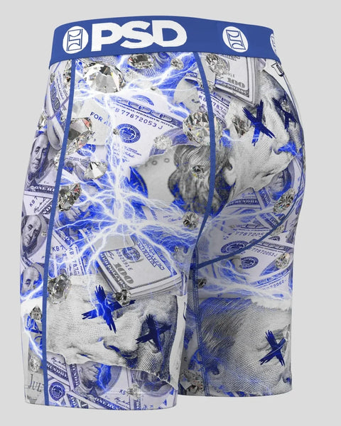PSD boxer briefs with blue waistband featuring dollar bills, diamonds, and lightning bolt print on white background.