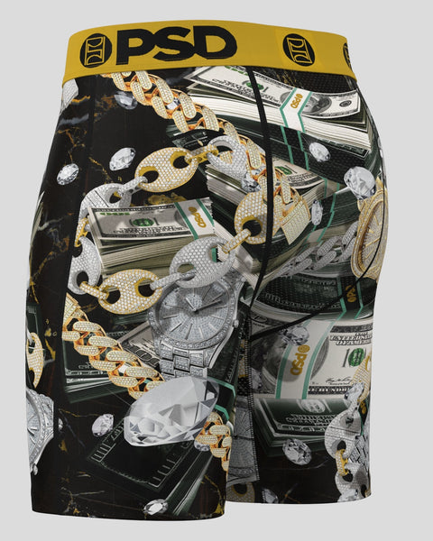 PSD boxer briefs with gold and silver chain, diamond, money, and watch print on black background.