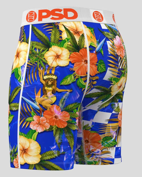 PSD boxer briefs with blue base featuring tropical hibiscus flowers, palm leaves, and golden figure graphic with white waistb