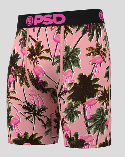 Pink shorts with flamingo and palm tree print, black PSD waistband with logo.