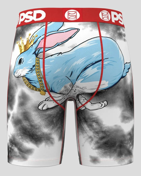 PSD boxers with blue rabbit wearing gold crown and chain on cloudy gray background.