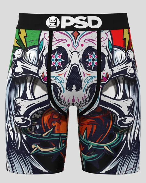 Black PSD boxer shorts with colorful skull and crossbones graphic design featuring purple, pink, teal, red, and green accents