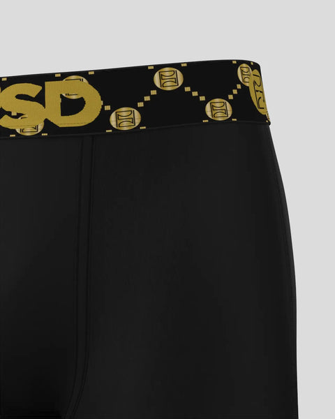 Black underwear with gold and black elastic waistband featuring geometric emblem pattern.