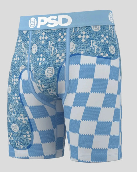 Three PSD boxer briefs in blue with geometric patterns, checkered design, and white waistband logo.