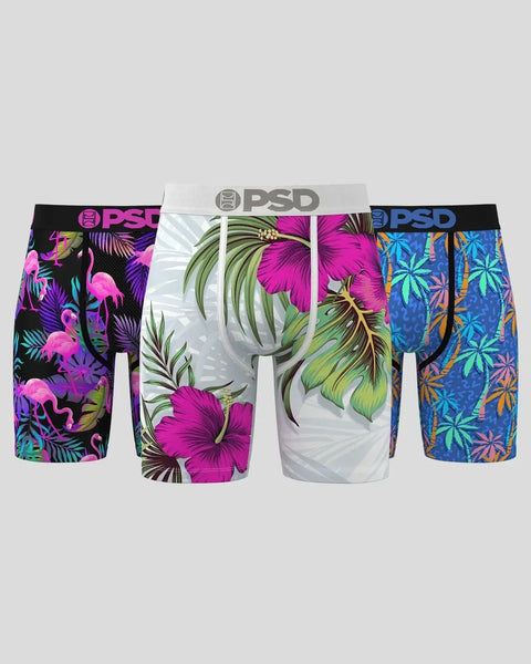 Three PSD brand boxer briefs with tropical floral prints in magenta, white, and blue colorways.
