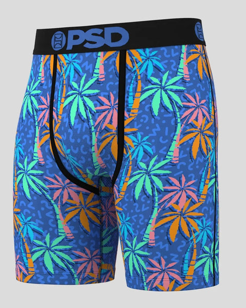 PSD brand men's shorts with blue base and colorful tropical palm tree and bamboo print, black waistband with logo.