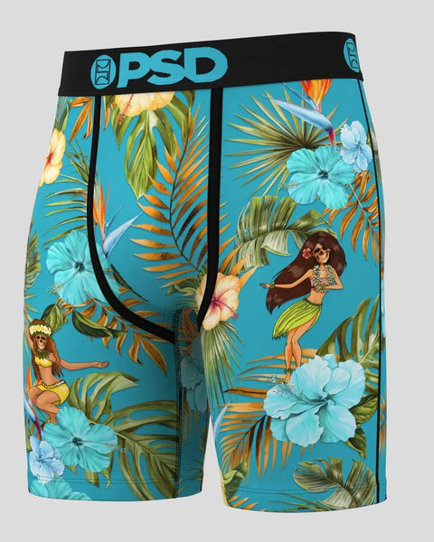 PSD brand boxer shorts with turquoise background, tropical flowers, palm fronds, and illustrated hula dancer figures.