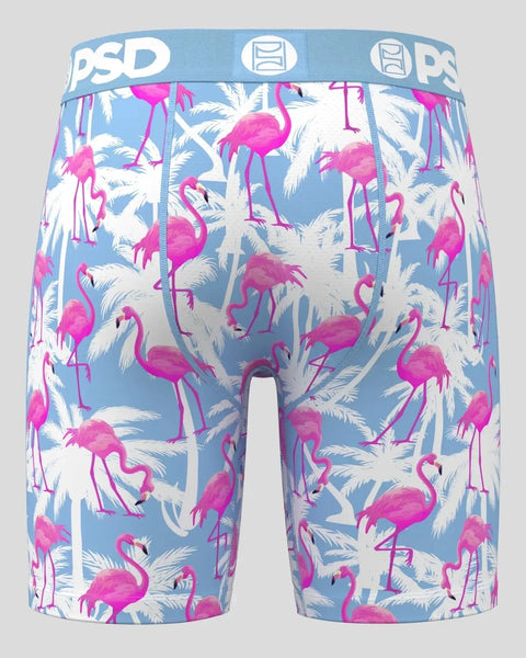 PSD boxer briefs with pink flamingos and white palm leaves on blue background.