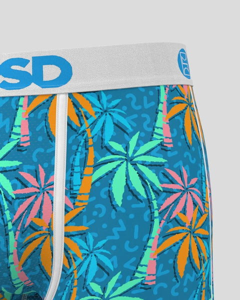 Teal boxer briefs with multicolored palm leaf and bamboo print, white waistband with blue branding.