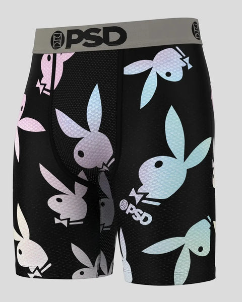 PSD brand black boxer briefs with pink, purple, and blue Playboy bunny heads and lightning bolt graphics.