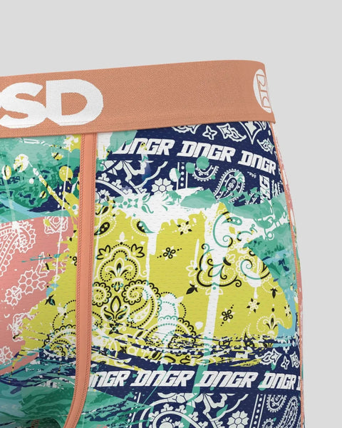 Boxer briefs with paisley and geometric patterns in navy, yellow, green, and coral with tan waistband.