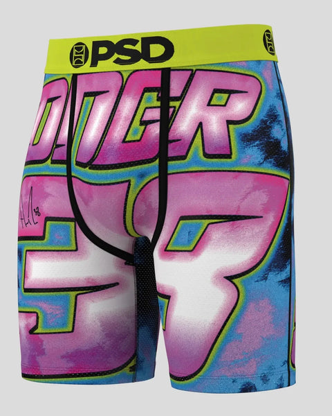PSD boxer briefs with lime green waistband and multicolored tie-dye design in pink, blue, and yellow.