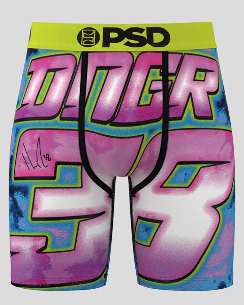 PSD boxer briefs with tie-dye pattern in pink, lime green, and blue with large graphic text and signature.