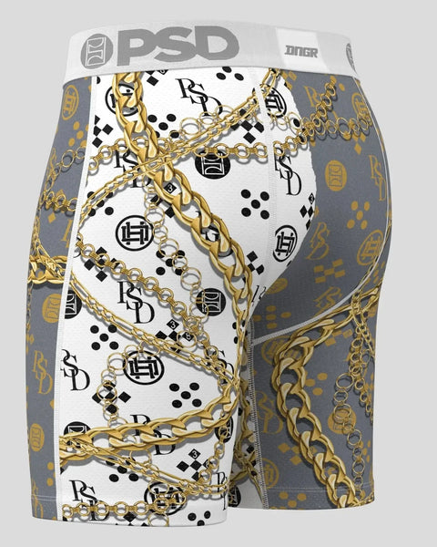Men's boxer briefs with white and gray panels featuring gold chain print, logos, and geometric patterns with PSD waistband.