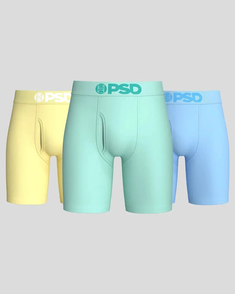 Three PSD boxer briefs in pastel yellow, mint green, and periwinkle blue with white waistband logos.