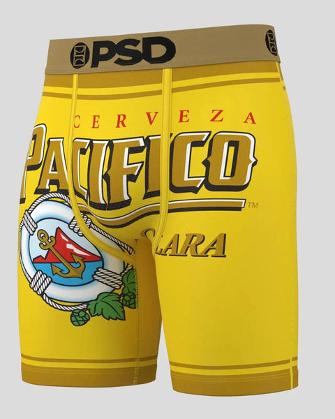 Yellow PSD boxer briefs with tan waistband, Pacifico beer branding, and circular logo graphic with rope design.