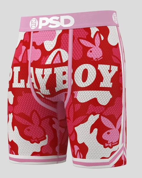 PSD boxer briefs with pink waistband featuring red and white camouflage pattern and Playboy bunny logos.
