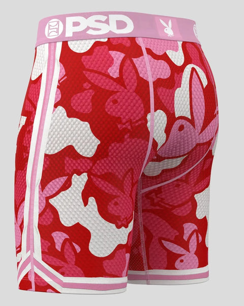 PSD boxer briefs with red, pink, and white camouflage pattern and Playboy bunny logo on waistband.