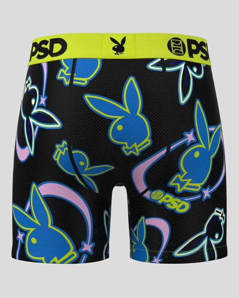 Black boxer shorts with neon blue and yellow Playboy bunny heads, pink swirls, and stars, PSD waistband.