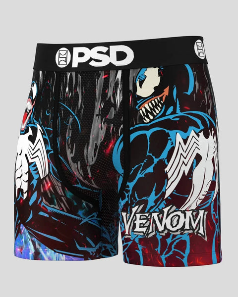 Black OPD boxer shorts featuring Venom character artwork in blue, white, and red with large teeth and menacing expression.
