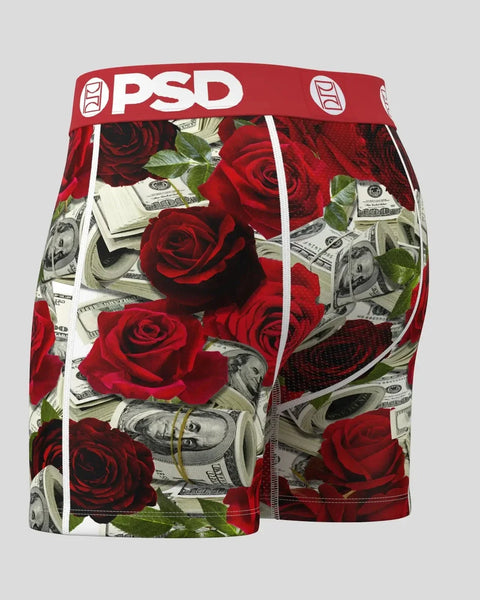 Red and dark roses with dollar bills printed on PSD brand boxer shorts with red waistband.