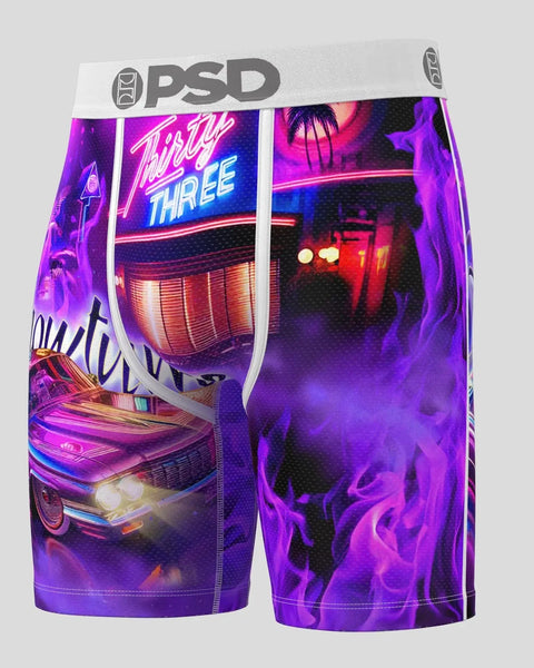 PSD underwear with neon diner and vintage car graphic print in purple, pink, and blue.