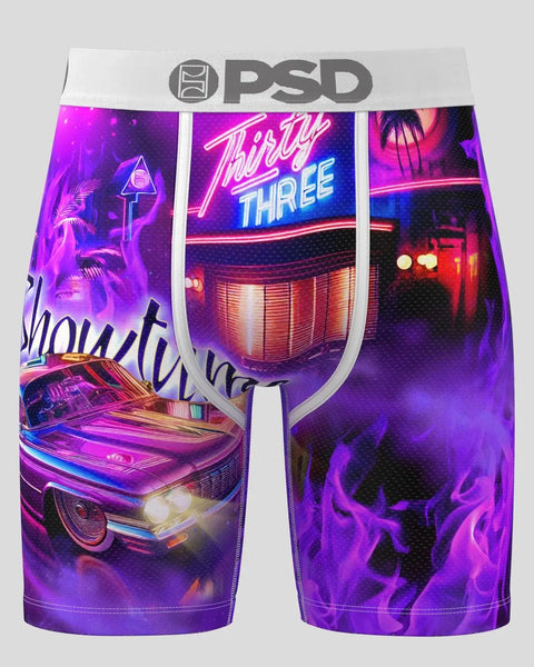 PSD boxer briefs with neon diner and vintage car graphics in purple, pink, and blue on white waistband.