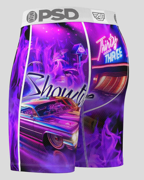 PSD shorts with neon purple diner scene featuring vintage car, palm trees, and 