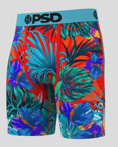 PSD boxer briefs with turquoise waistband and tropical leaf print in red, blue, purple, and green.