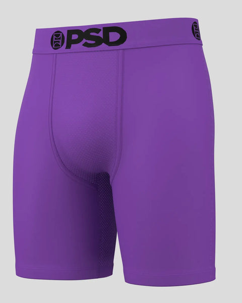 Purple PSD brand boxer briefs with black waistband logo and textured panel detail on thigh.