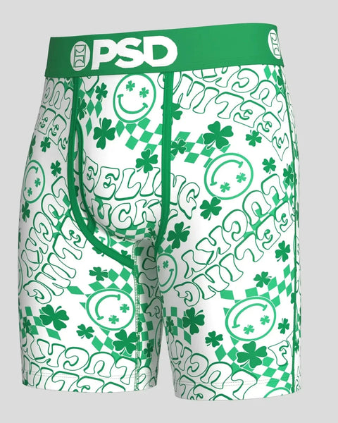 PSD men's boxer briefs with green and white lucky-themed pattern including clovers, smiley faces, and diamond shapes.