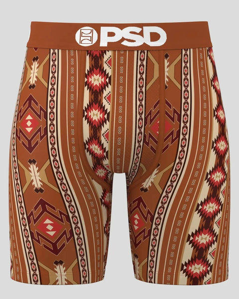 Brown PSD boxer briefs with Aztec-inspired geometric patterns in cream, red, and burgundy stripes and diamond shapes.