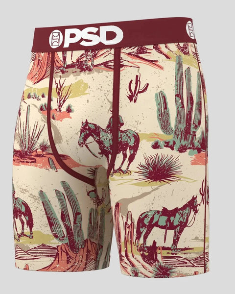 PSD boxer briefs with desert ranch print featuring cacti, horses, and cowboys in burgundy, cream, and sage tones.