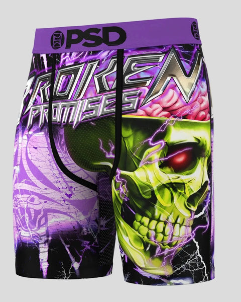 PSD boxer shorts with purple waistband featuring neon skull graphics, lightning bolts, and "Broken Promises" text design.
