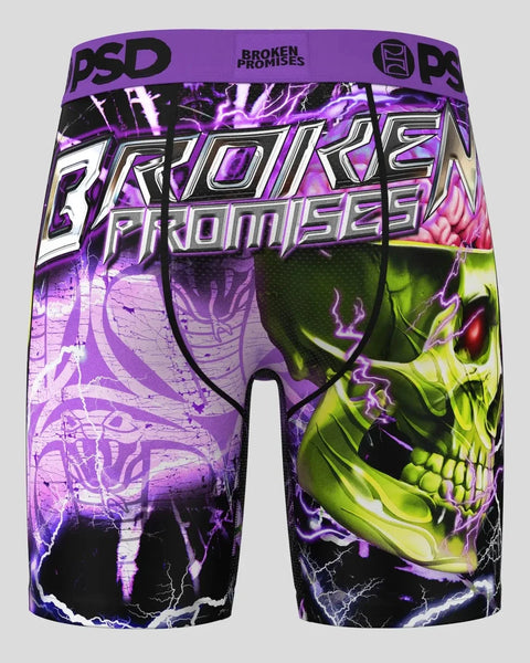 Purple and black PSD Broken Promises boxer briefs with skull and lightning bolt graphic design.