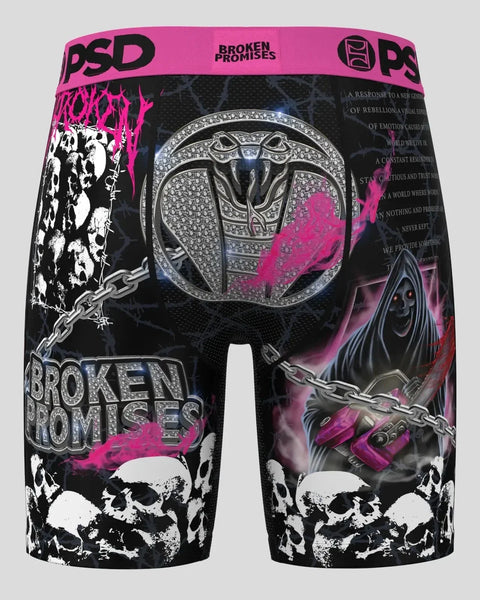 PSD black shorts with pink and white graphic designs, skull motifs, and 