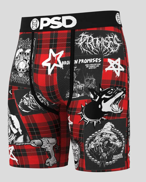 PSD boxer briefs with red and black plaid pattern, white stars, and graphic artwork including skulls and text designs.