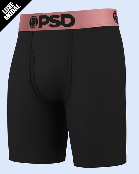 Black boxer briefs with rose gold waistband featuring OPSD logo and decorative side design.