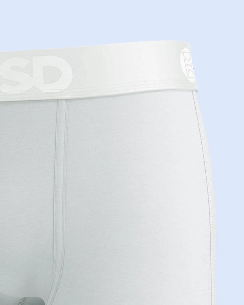 Light gray modal briefs with elastic waistband and side seams against a blue background.