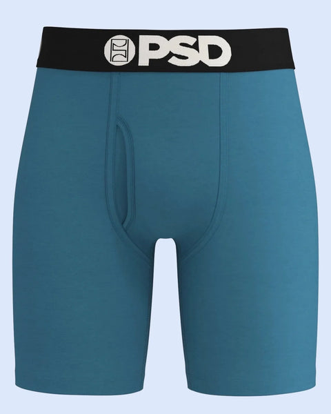Teal boxer briefs with black waistband featuring PSD logo and white center seam detail.