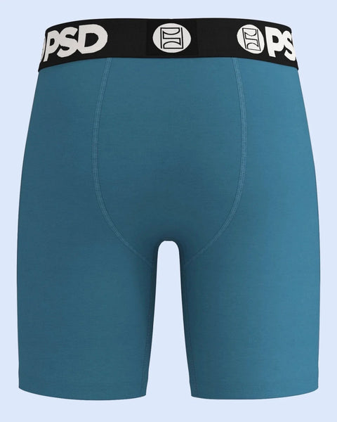 Teal modal boxer briefs with black and white PSD waistband and center seam stitching.